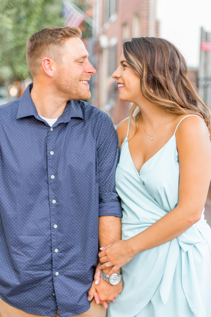light and airy dusty blue dress engagement photo