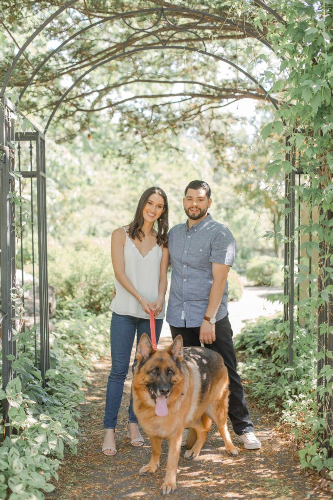 dog with couple at engagement session at cross estate gardens