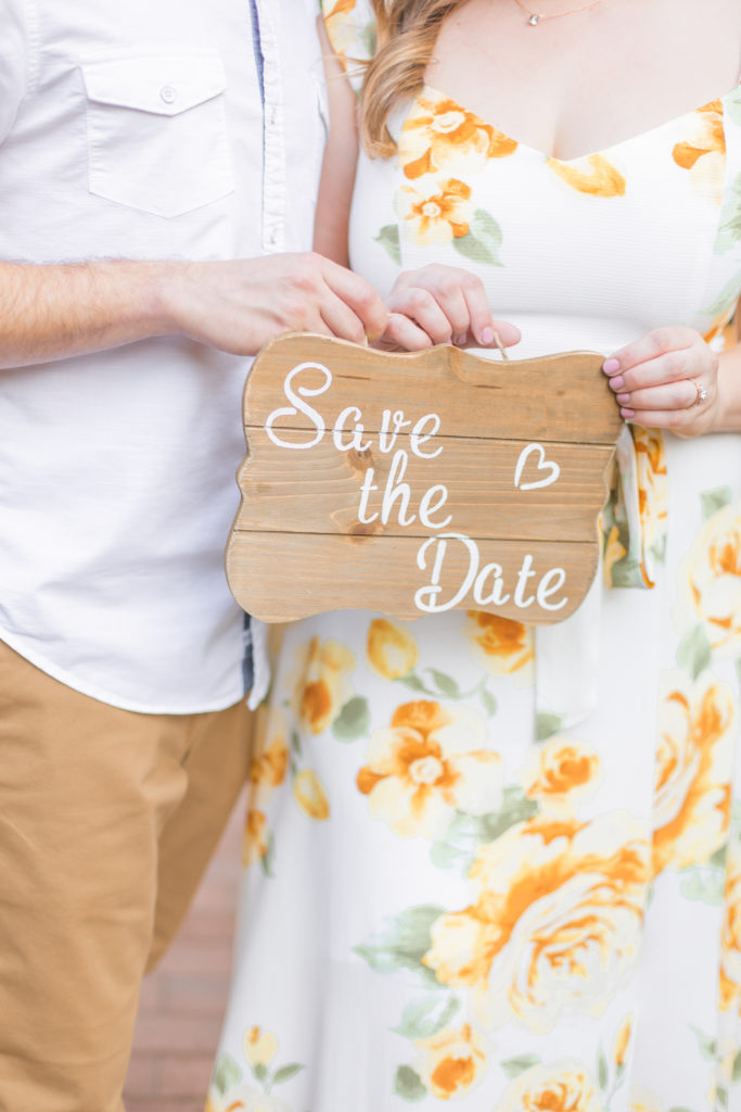save the date sign engagement photo