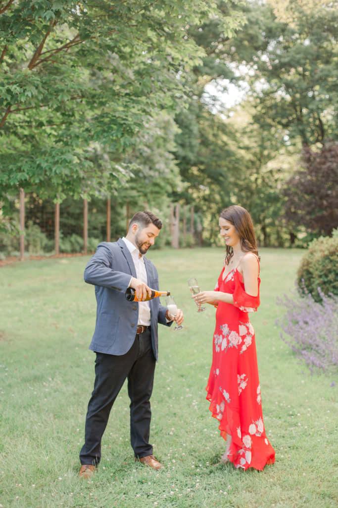 champagne toast engagement photography