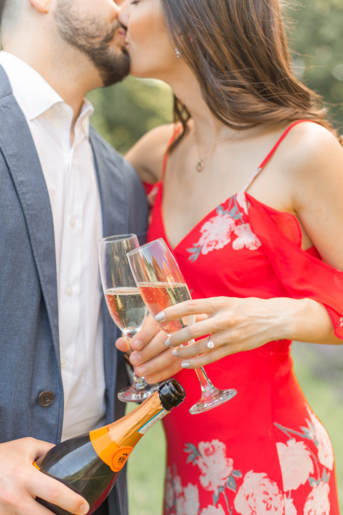 champagne glasses engagement photography