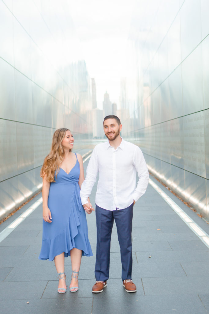 Liberty state park empty sky memorial engagement photo