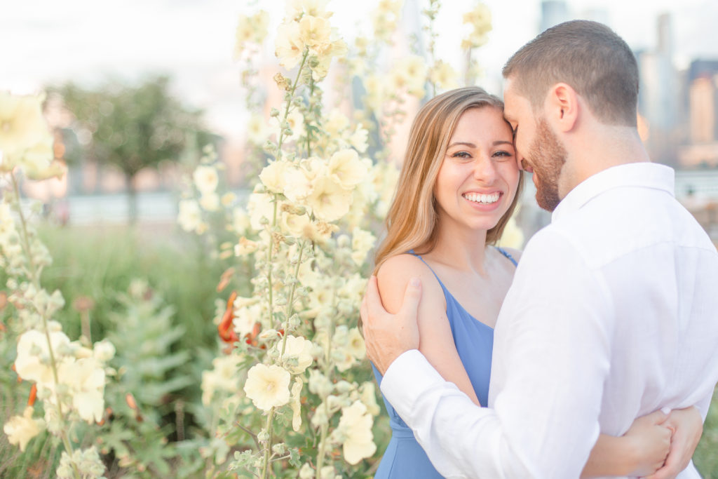 light and airy engagement photo in flower bushes in New Jersey park