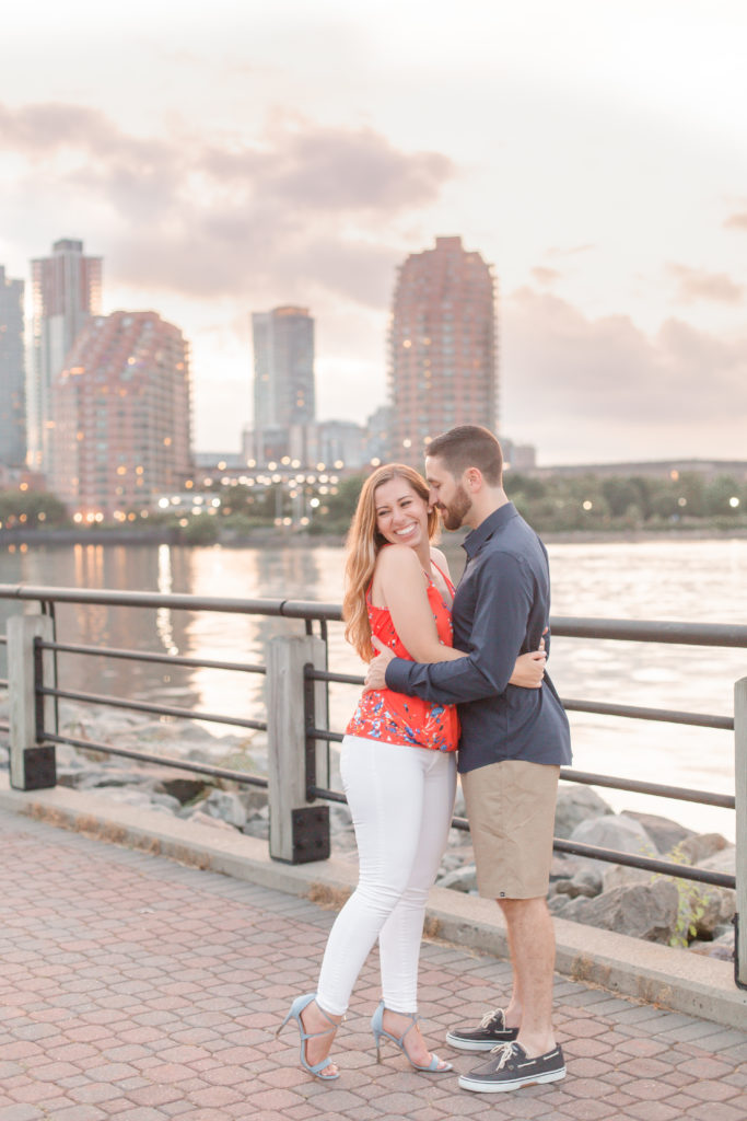 new  york city skyline light and airy engagement photo at liberty state park in jersey city, new jersey