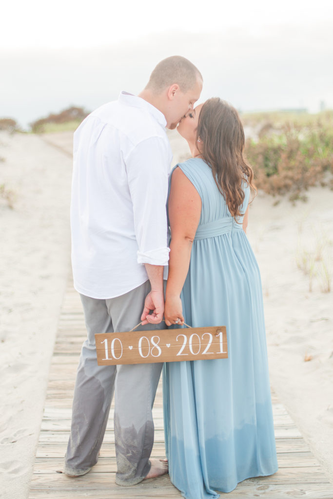 beach engagement photos save the date sign
