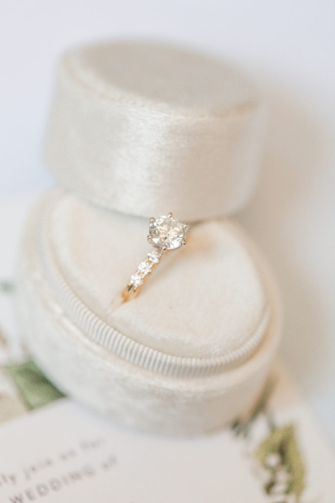 light and airy engagement ring white velvet ring box