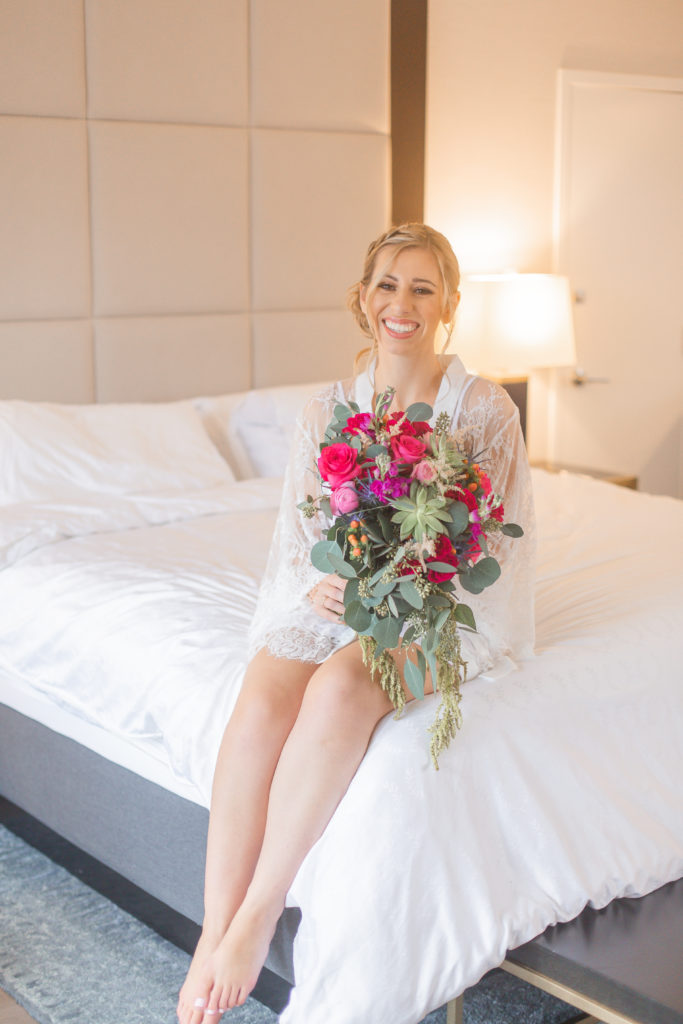 asbury park wedding photos with pink bouquet at sheraton eatontown hotel