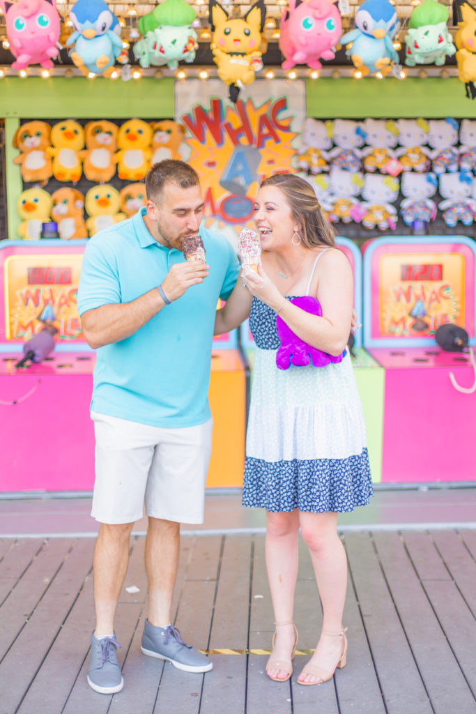 point pleasant boardwalk games engagement photos  new jersey engagement session nj wedding photographers light and airy