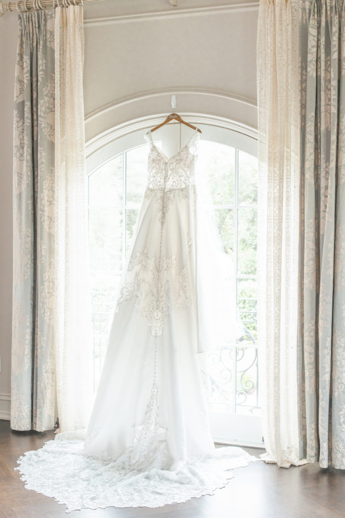 dress hanging in the bridal suite of the park chateau wedding photography