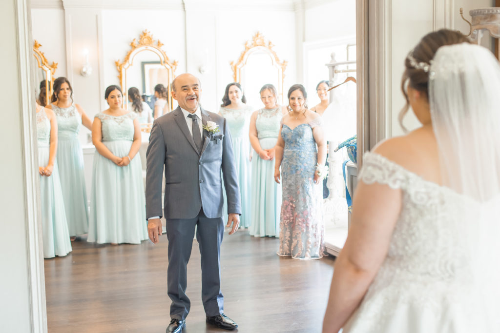 father and daughter first look in bridal suite at new jersey wedding